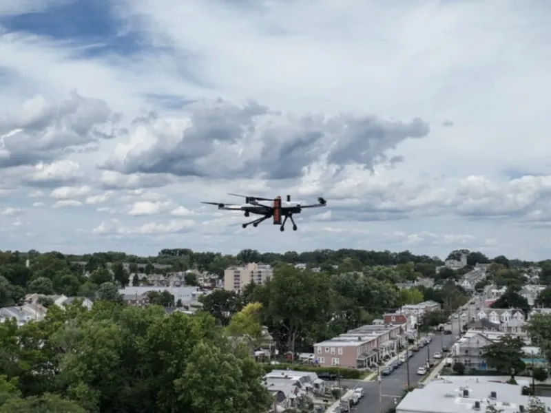 Security drone in flight over a site